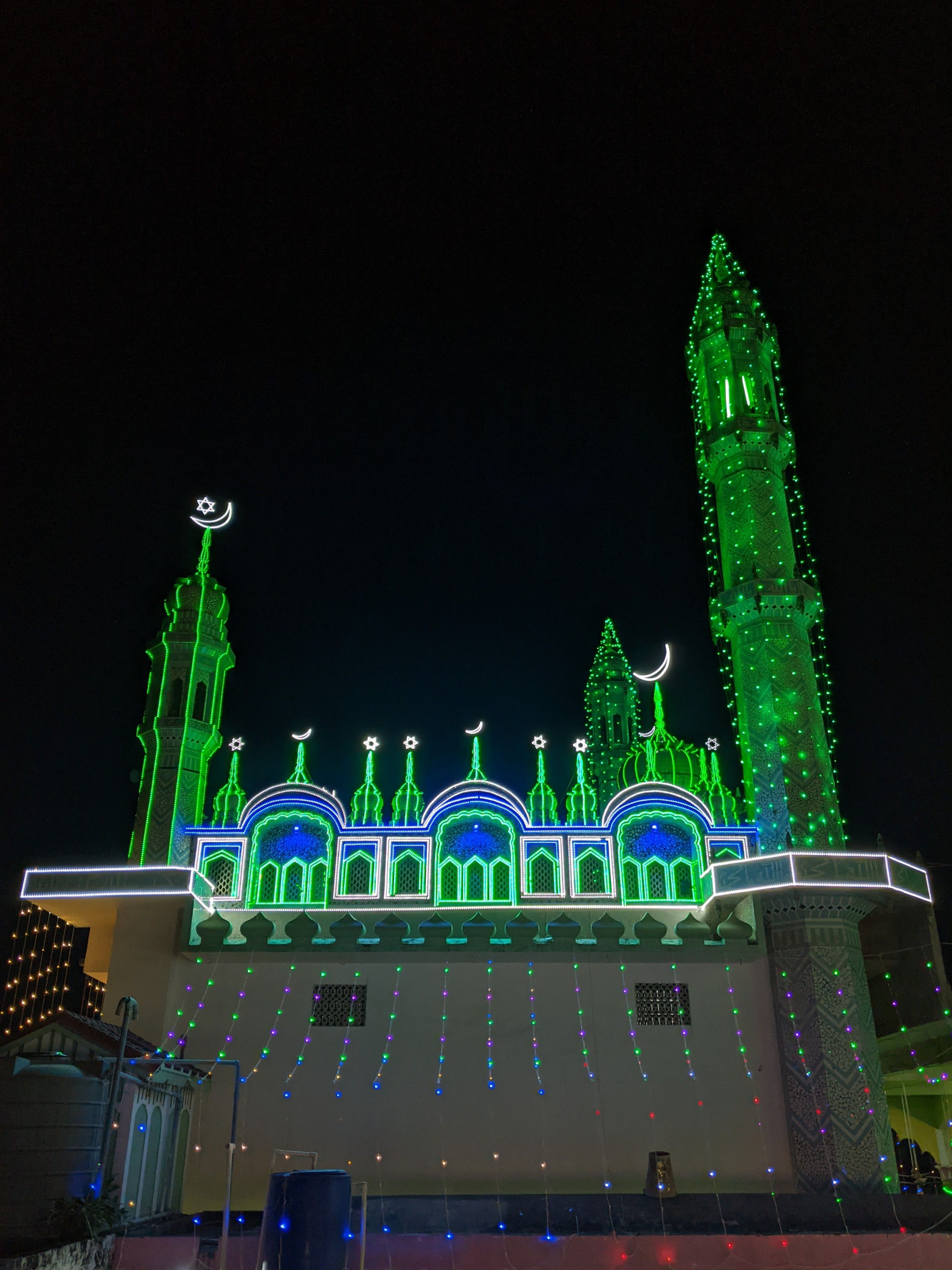 Illuminated Mosque with Green Lighting at Night · Free Stock Photo