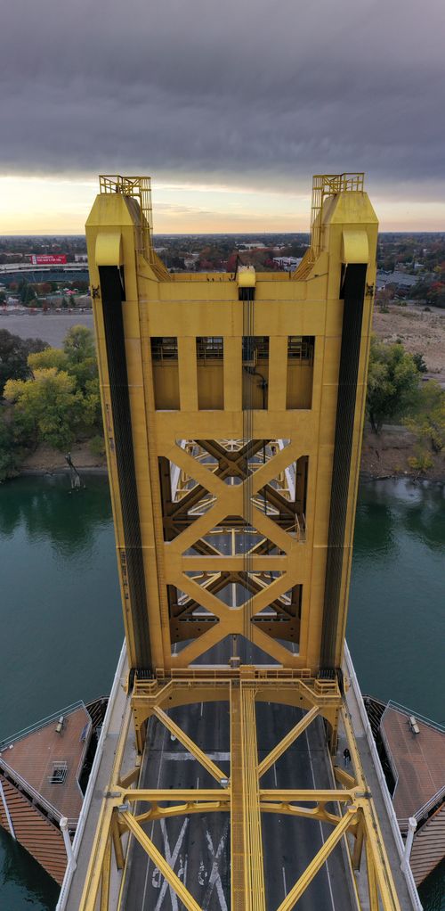 Free Aerial shot capturing the iconic Tower Bridge over the Sacramento River. Stock Photo