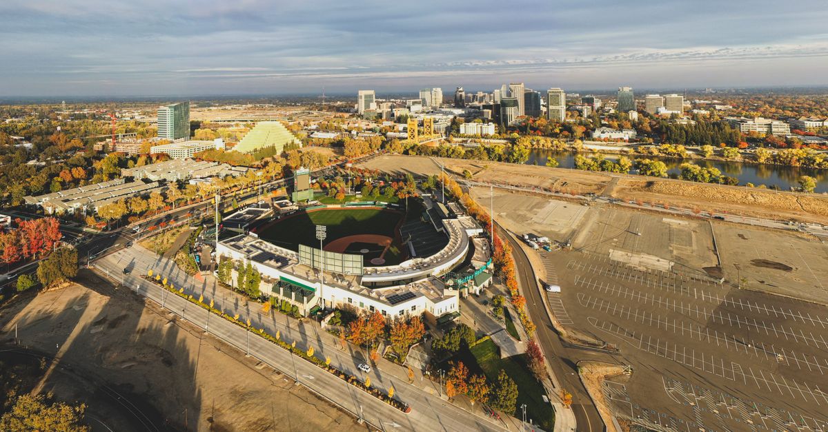 Drone shot of Sacramento skyline featuring the Tower Bridge and surrounding areas.