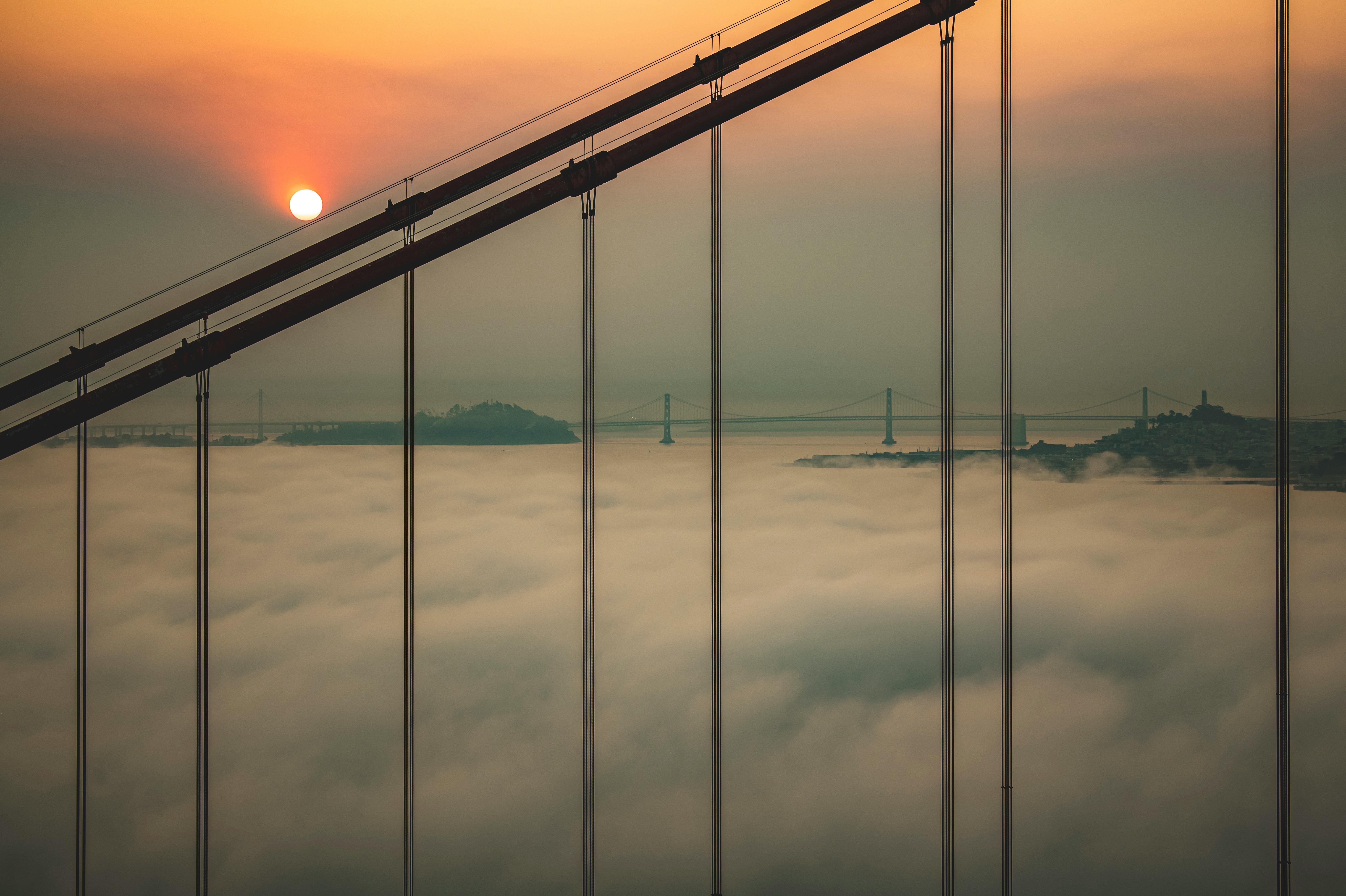 Golden Gate Bridge sunset + fog — 1937 Art Deco + International Orange + 2.7km span + most-photographed bridge