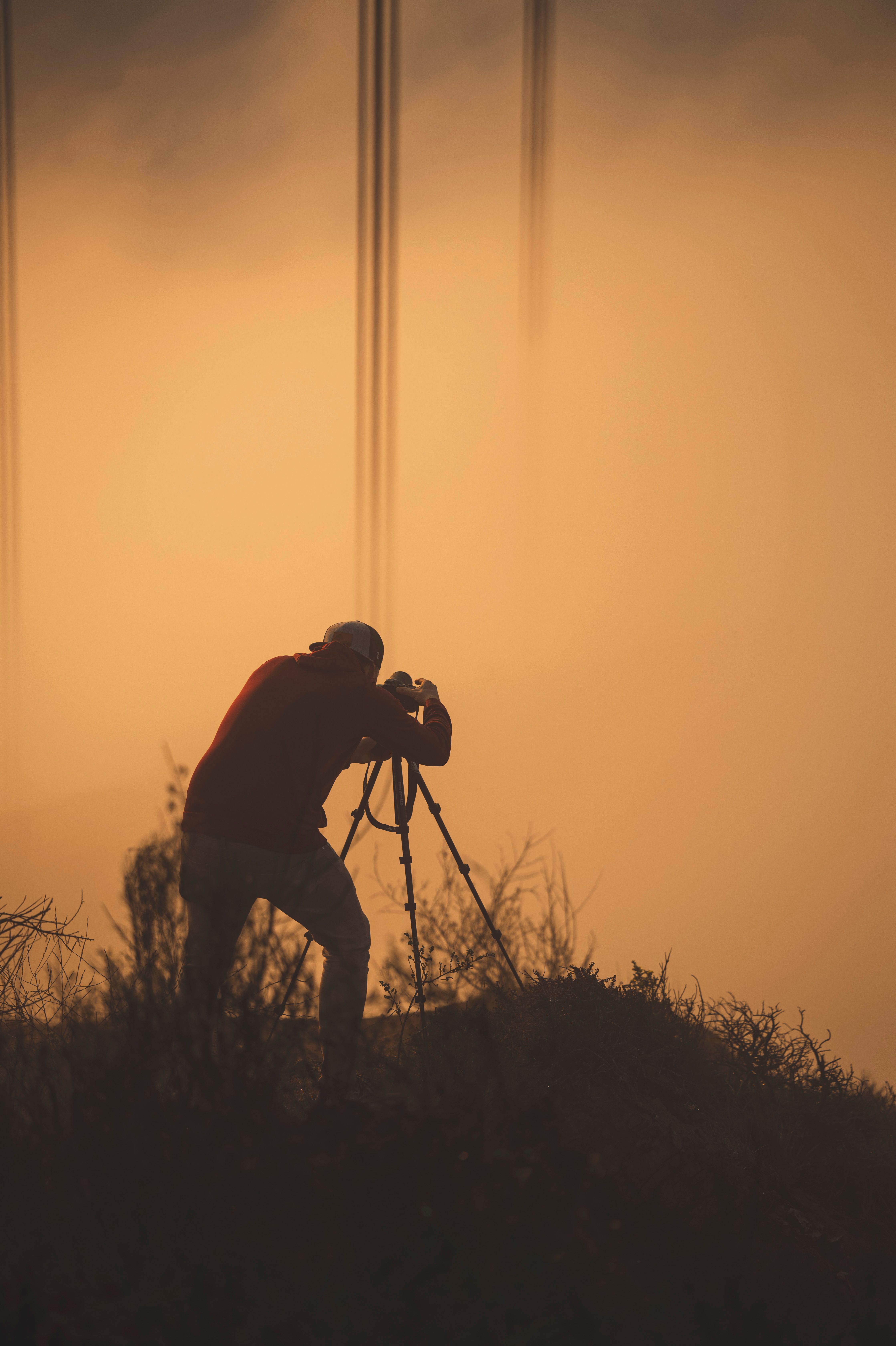 Silhouette Photography at Sunset with Tripod · Free Stock Photo