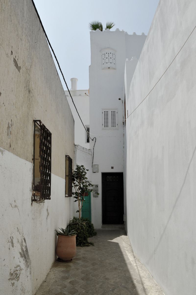 Whitewashed buildings and blue accents in Asilah