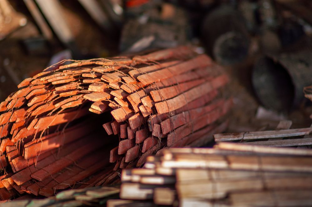 Close-up of stacked wooden boards in industrial storage