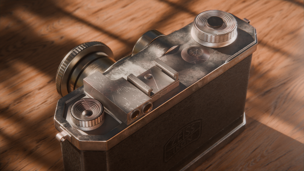 Top-view of a classic Zeiss Ikon camera with natural lighting.