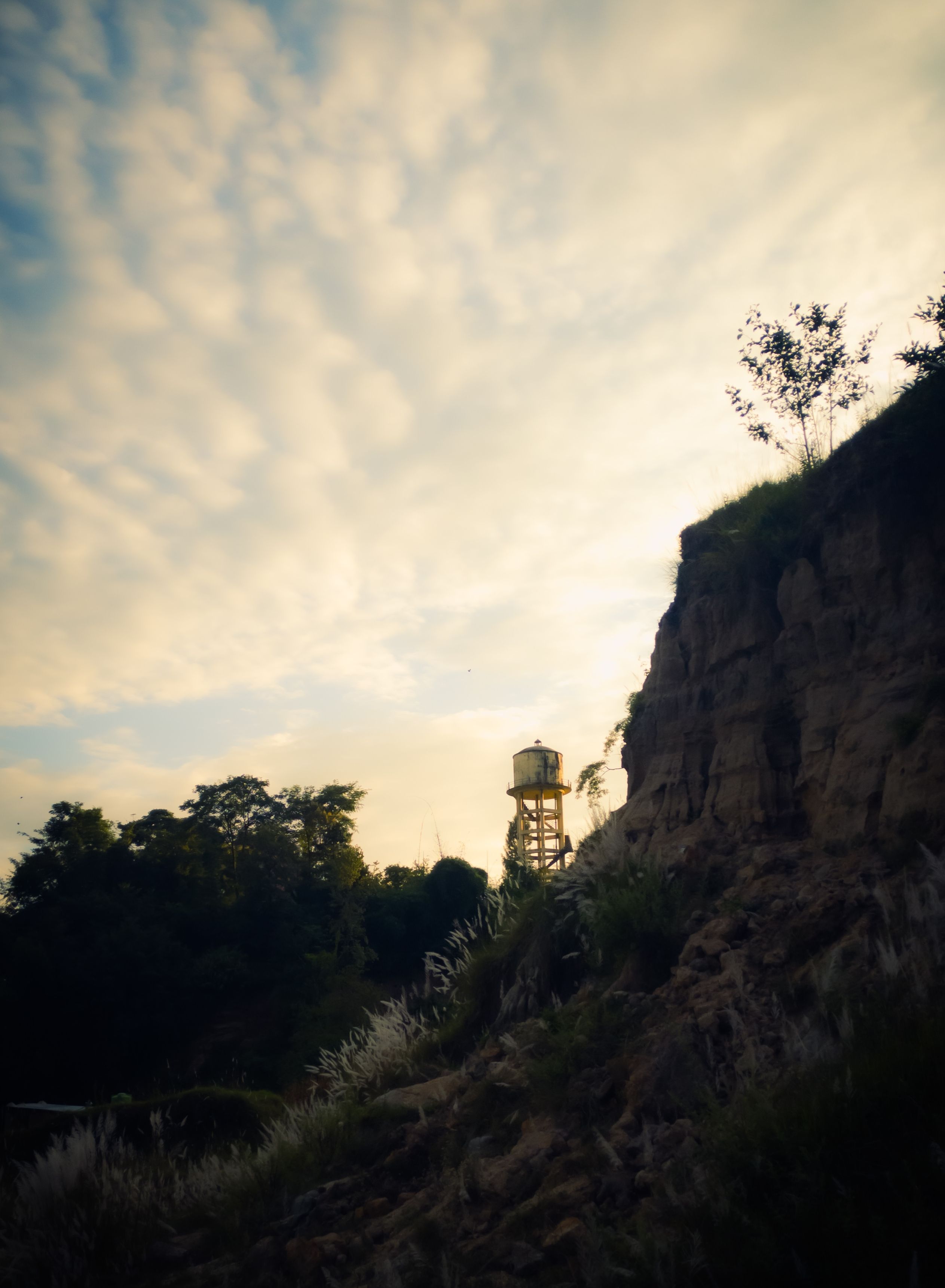 Scenic View of Water Tower at Sunset · Free Stock Photo