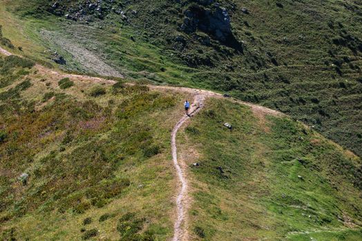 Aerial View of a Hiker on a Mountain Path