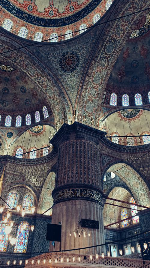 Free Stunning architectural detail of a mosque's intricately designed dome interior. Stock Photo