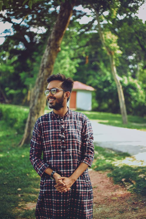 Free stock photo of green tree, man smiling, man wearing glasses