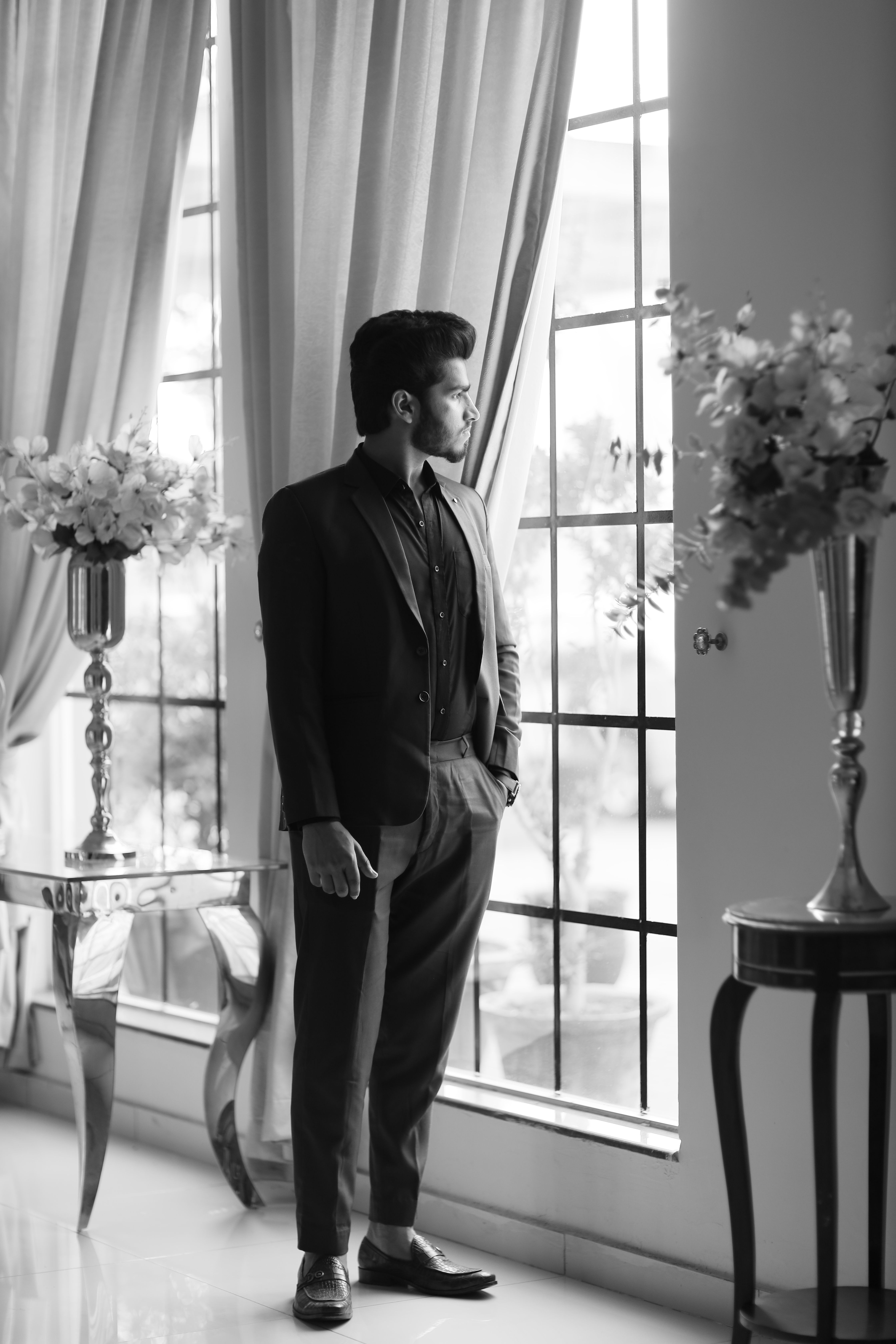 Elegant Black and White Portrait of Man in Suit · Free Stock Photo