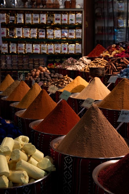 Colorful Spice Market Display with Assorted Spices ยท Free Stock Photo