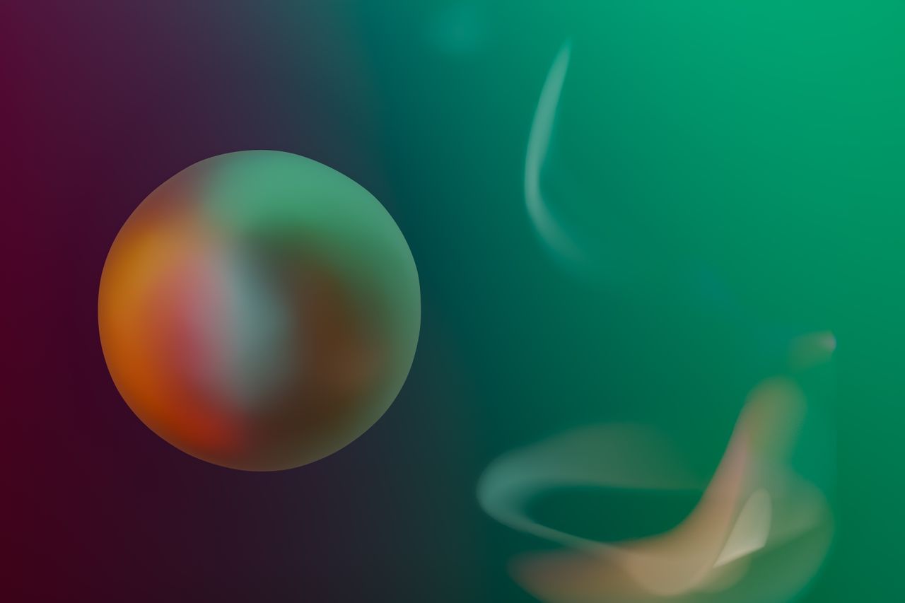 a vibrant abstract image featuring a colorful blurred sphere and wavy