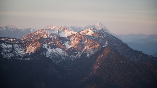 Free Gorgeous view of the snow-capped Alps at sunrise in Garmisch-Partenkirchen, Germany. Stock Photo