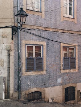 Exterior view of a traditional blue tiled building in Lisbon, Portugal.