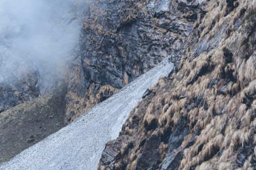 Free Explore the misty mountain slopes of Annapurna, Nepal, capturing rugged beauty and pristine nature. Stock Photo