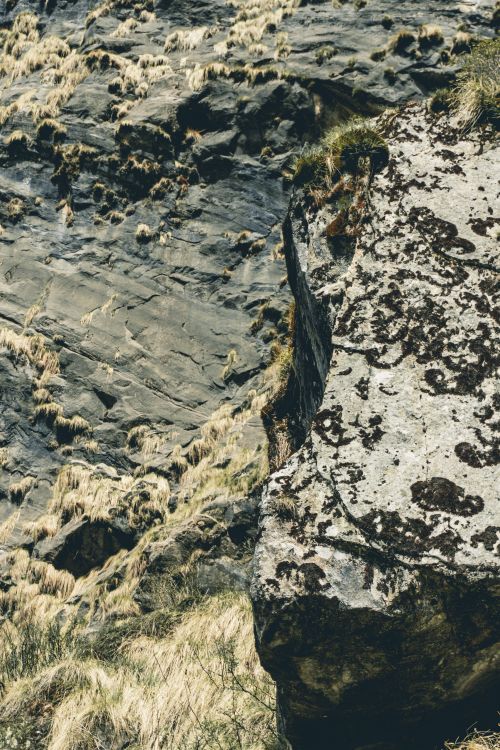 Free A breathtaking view of the rugged cliffside landscape in Annapurna, Nepal. Stock Photo