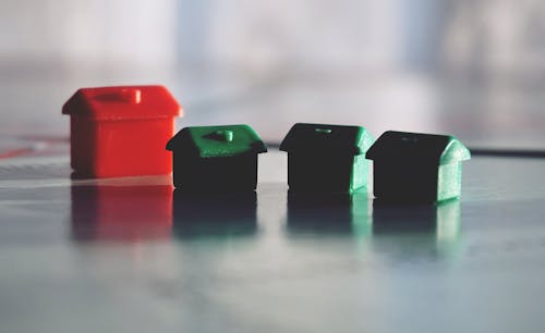 Free Three Green and One Red House Toys Stock Photo
