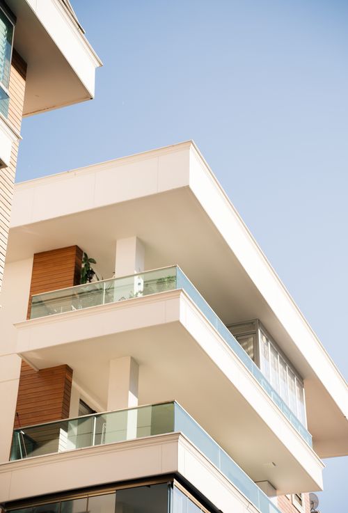 Free Elegant modern building exterior under a clear blue sky. Stock Photo