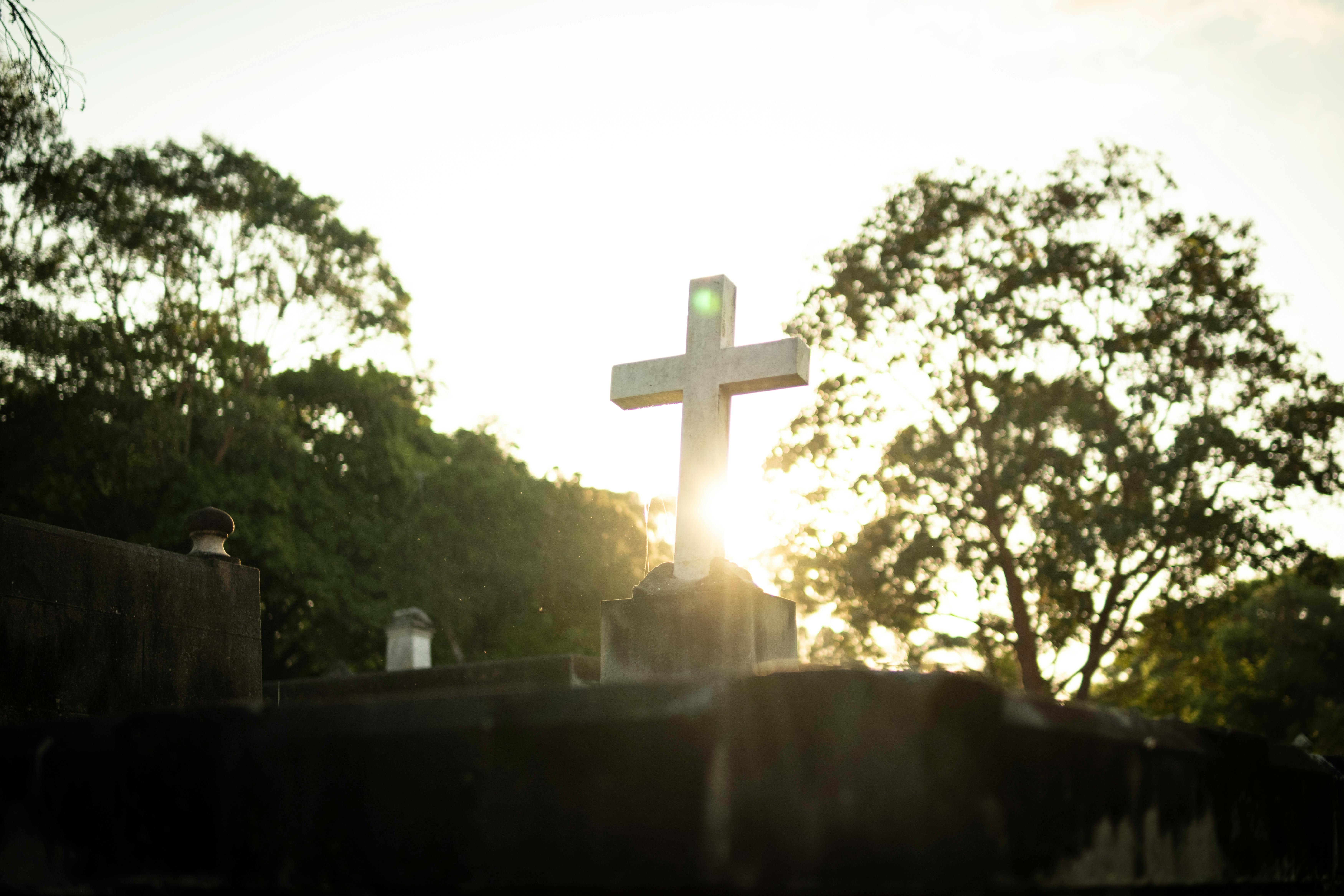 gothic cross at sunset in toowong cemetery