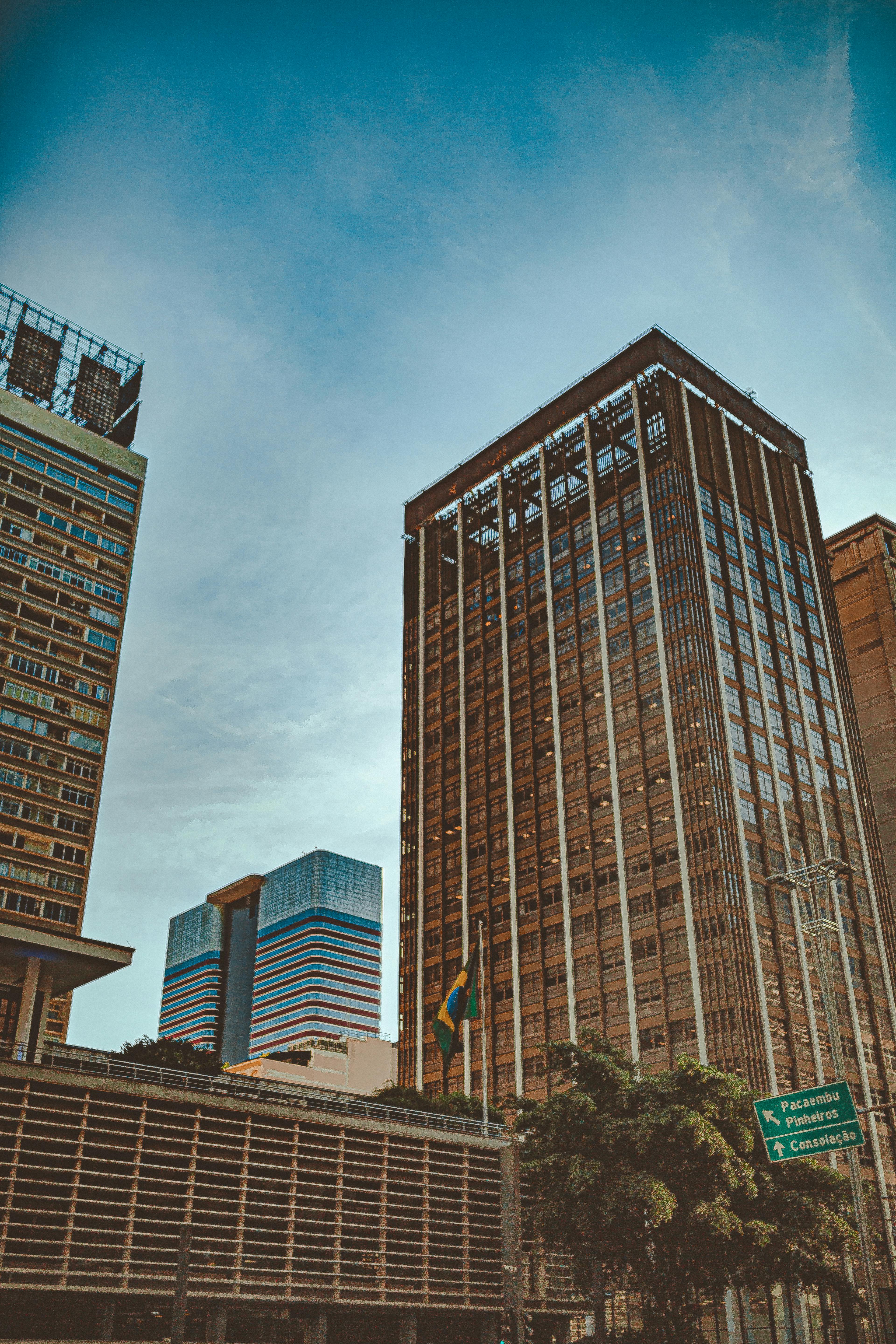 photo of high rise buildings under clear sky