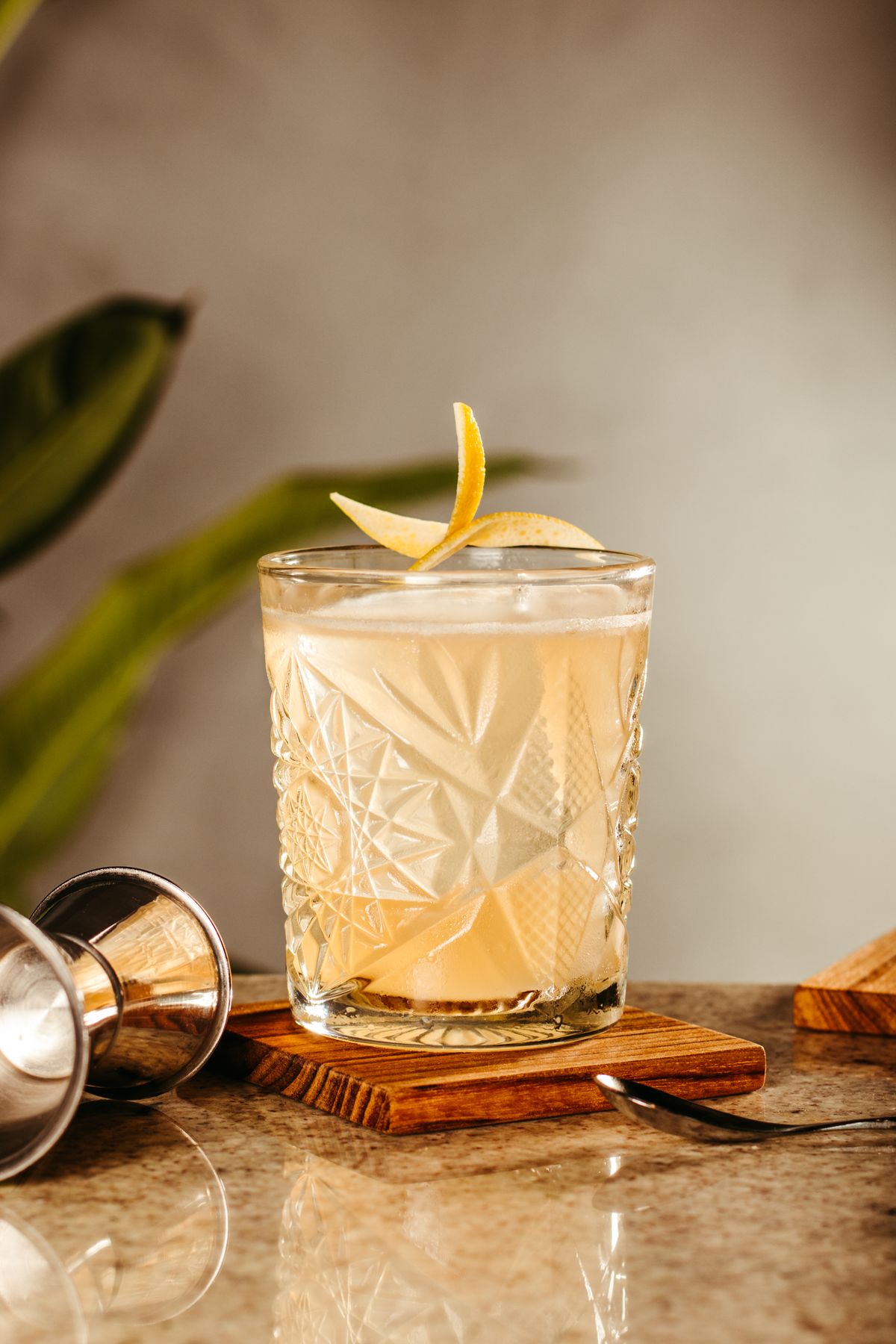 Botanical cocktail finished with a lemon twist