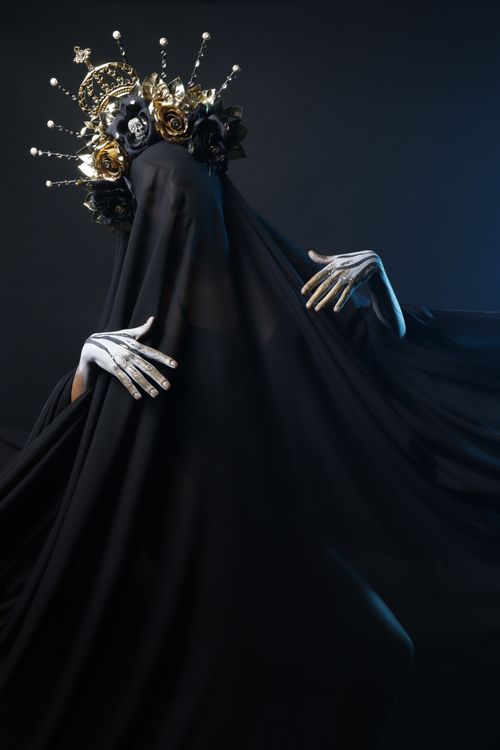 Mysterious Figure in Black Veil with Intricate Crown · Free Stock Photo