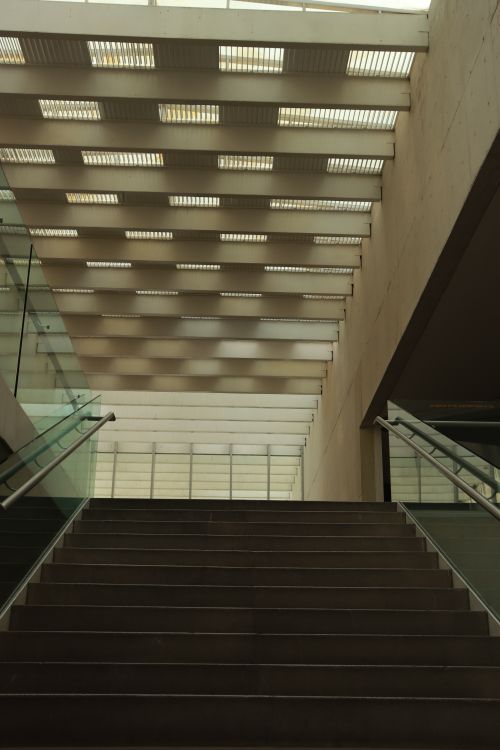 Free Interior view of a modern staircase with geometric skylight design. Stock Photo