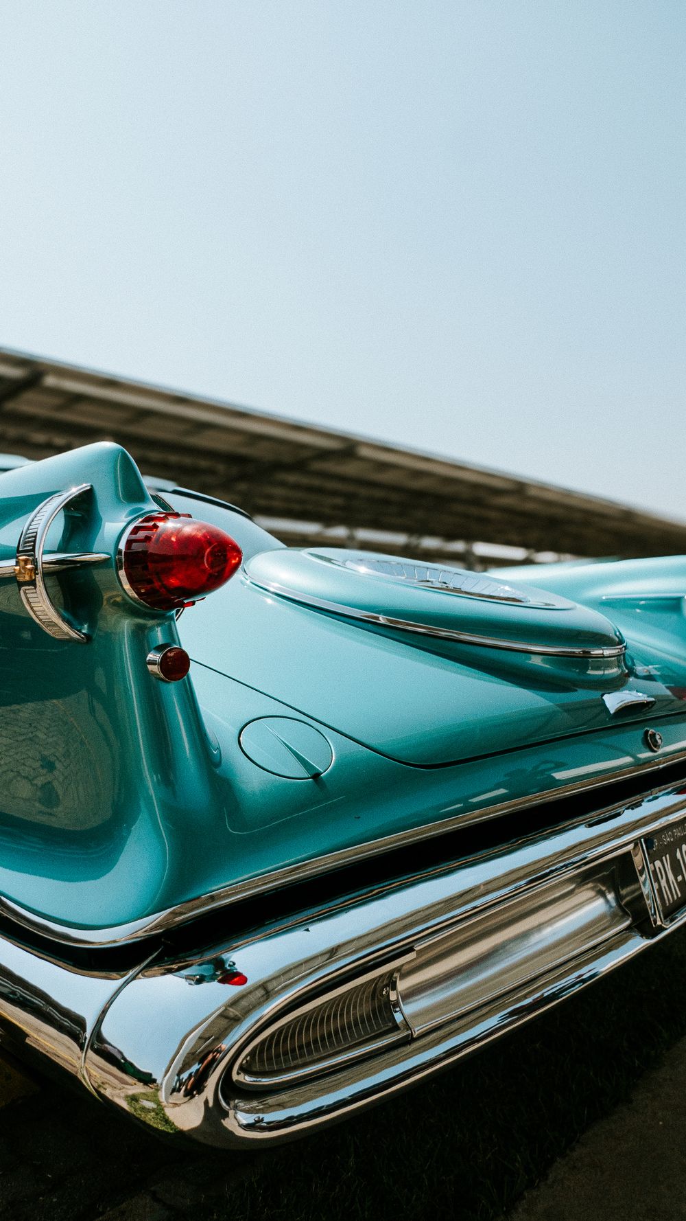 A classic blue vintage car outdoors