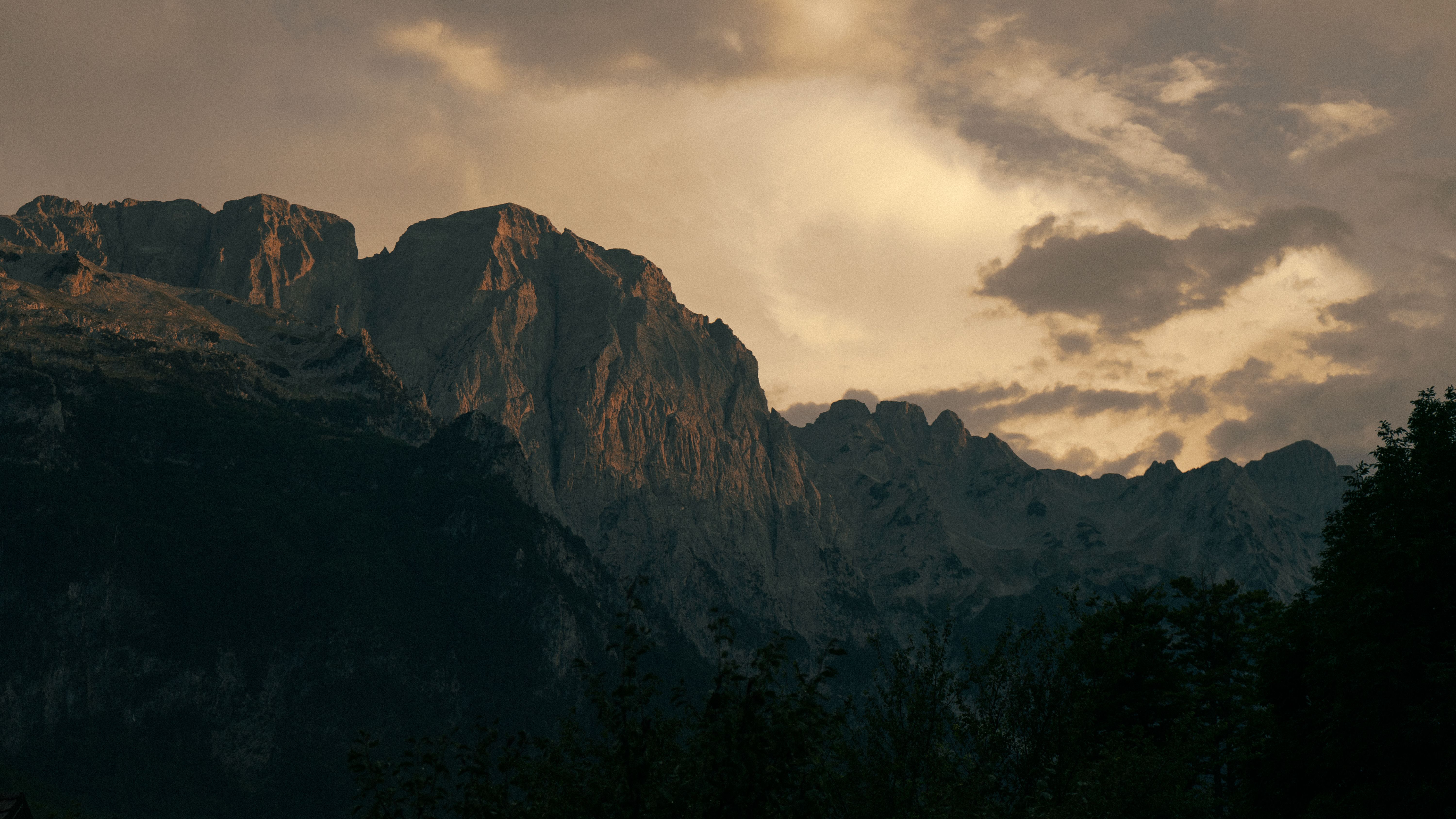Hikers enjoying a breathtaking view in the Albanian Alps