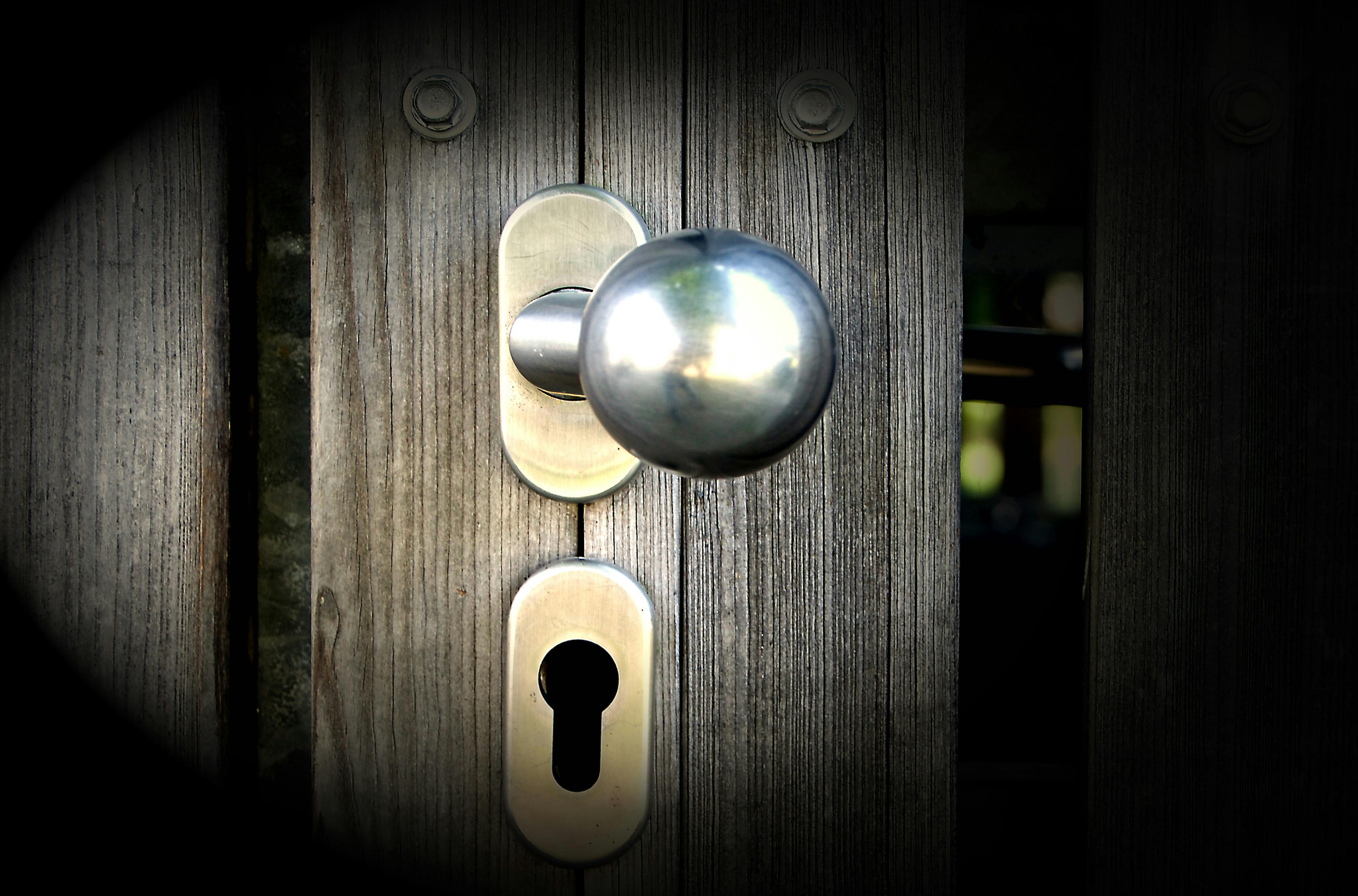 silver door knob and deadbolt