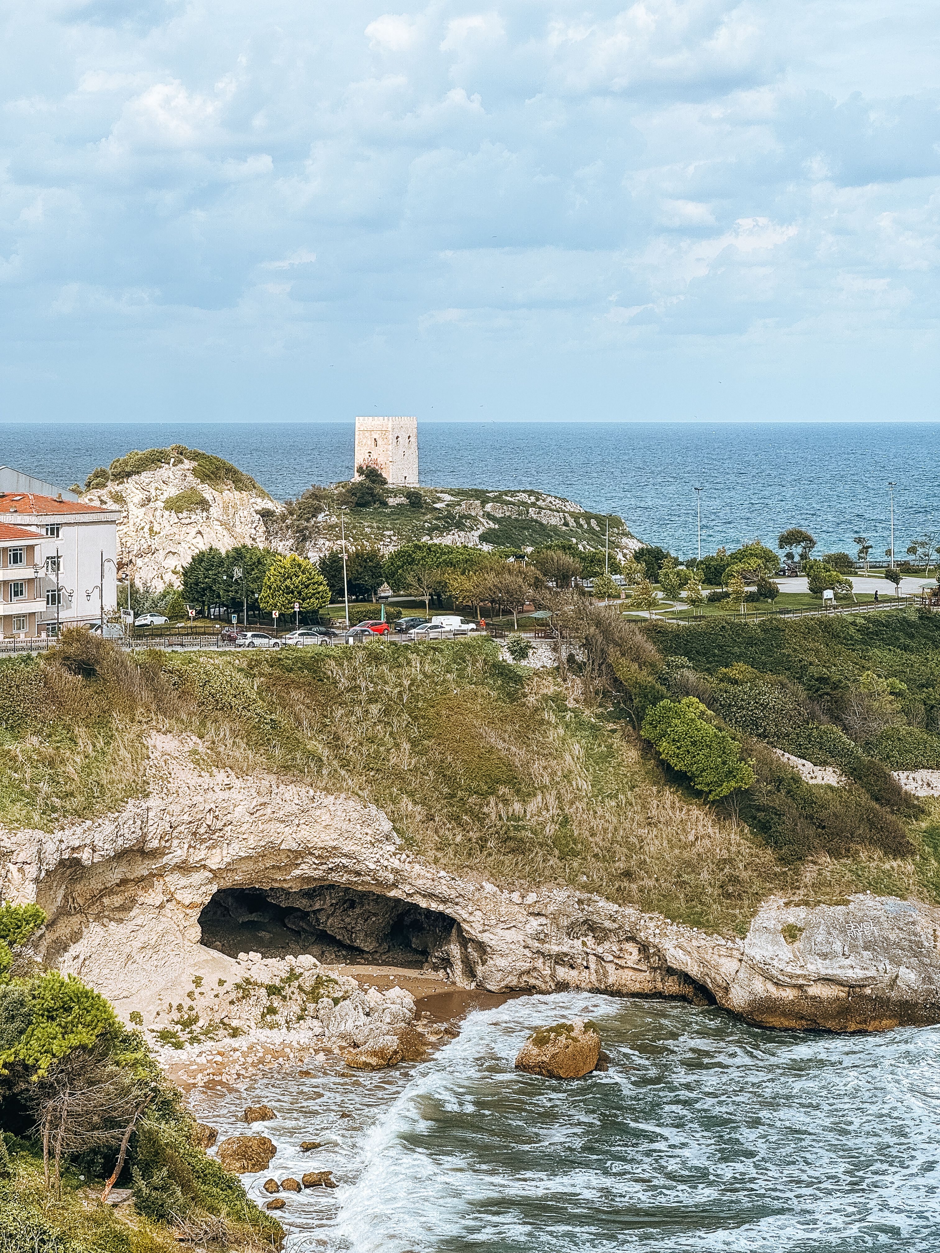 Coastal landscape with ancient stone tower · Free Stock Photo
