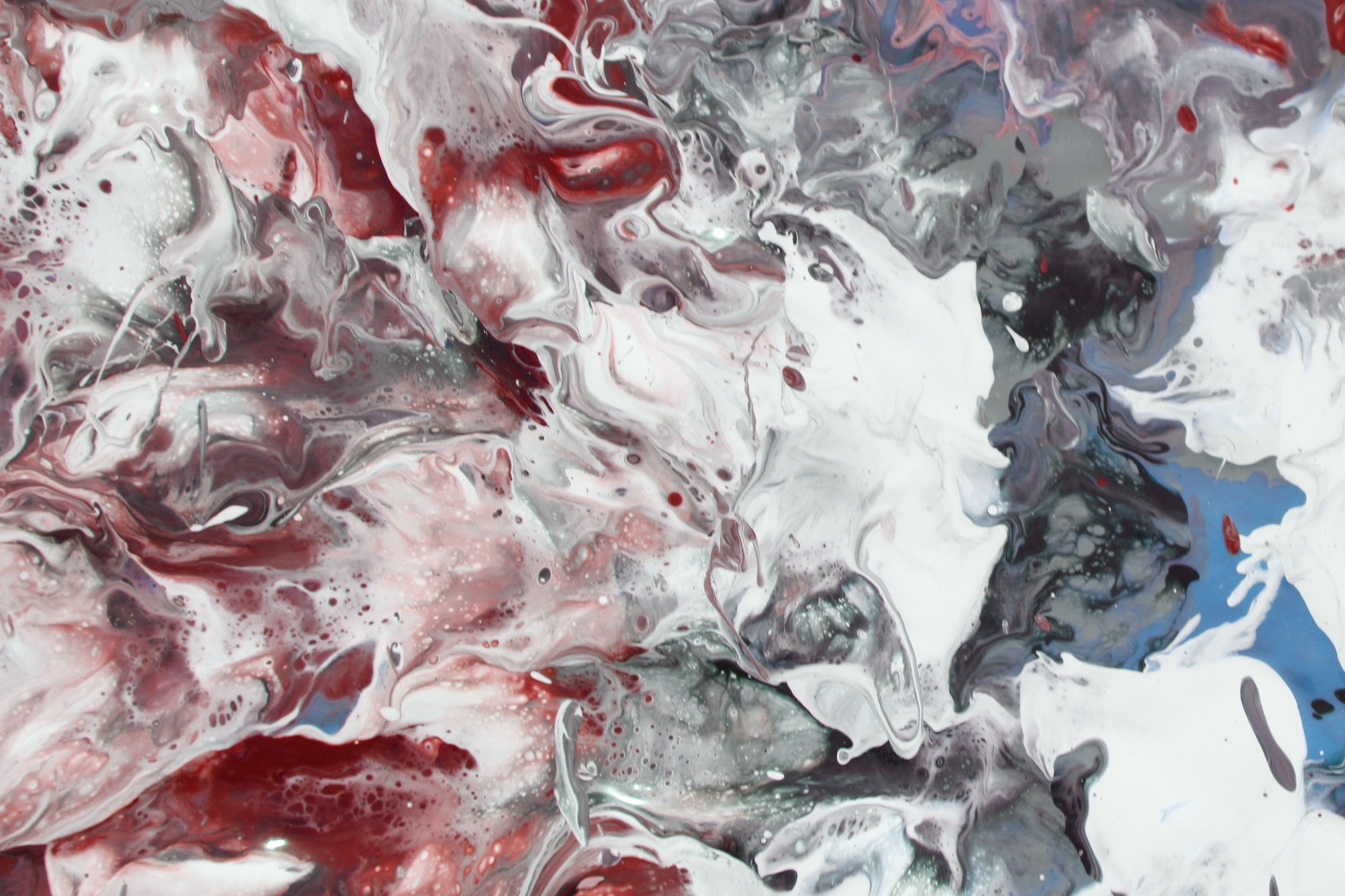 Colorful Abstract Fluid Art with Red and Gray Swirls · Free Stock Photo