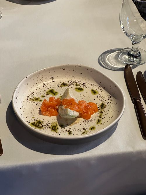 Free Exquisite gourmet dish with salmon tartare and cream served at a fine dining restaurant in Almaty, Kazakhstan. Stock Photo