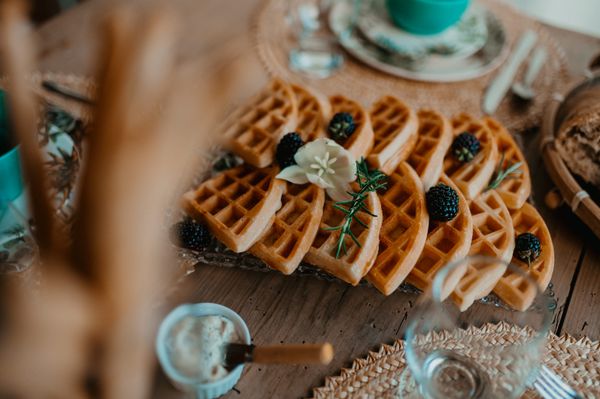 Waffles with berries on a rustic table, photo by Jonathan Borba on Pexels