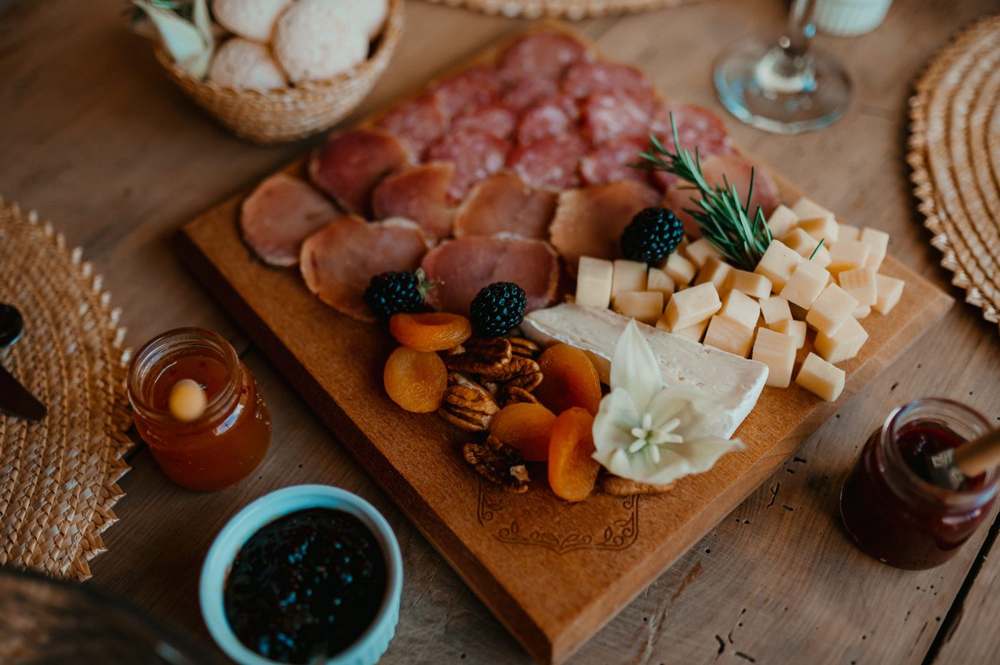 Artisan charcuterie spread with cheese, salami, fruit, and crackers