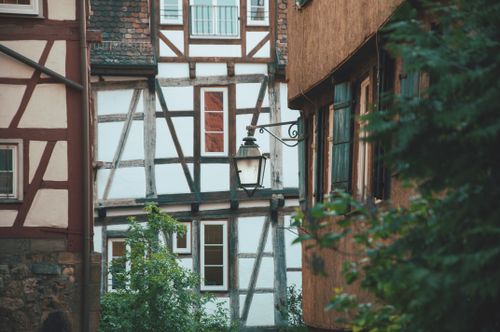 Free Picturesque view of traditional European half-timbered houses in an old town. Stock Photo