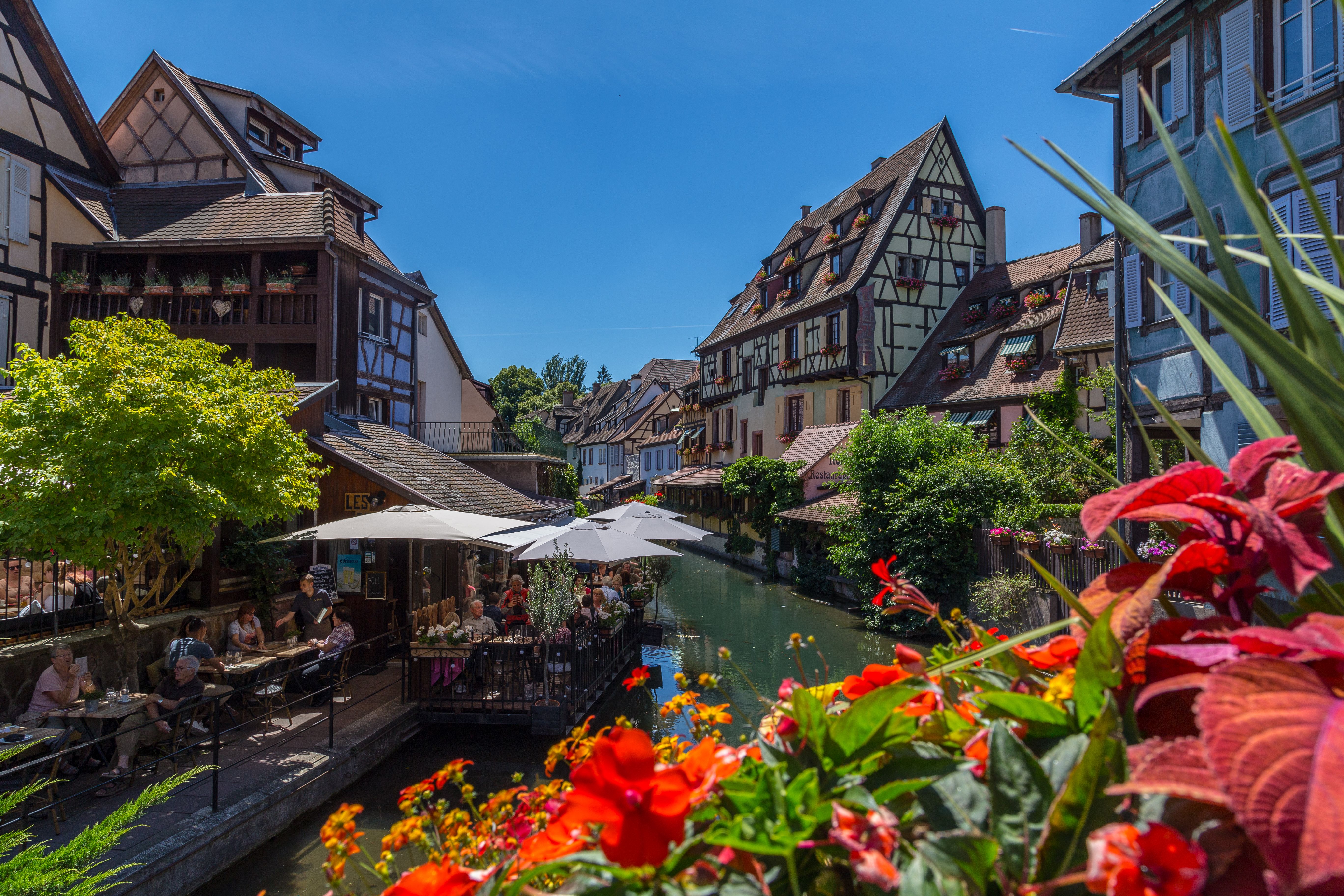Charming Riverside Cafe In Colmar France Free Stock Photo