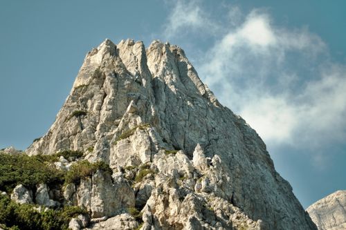Free Stunning jagged mountain peak in the Soča Valley under clear blue skies. Stock Photo
