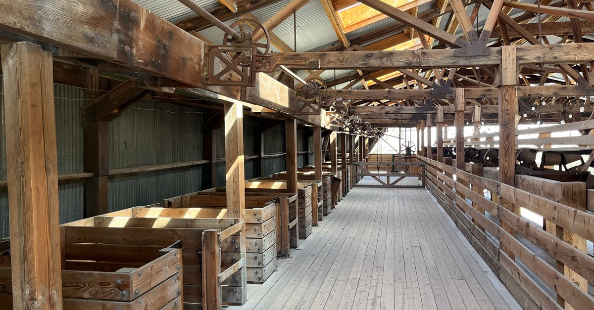 Rustic Interior of Wooden Barn with Beams ยท Free Stock Photo
