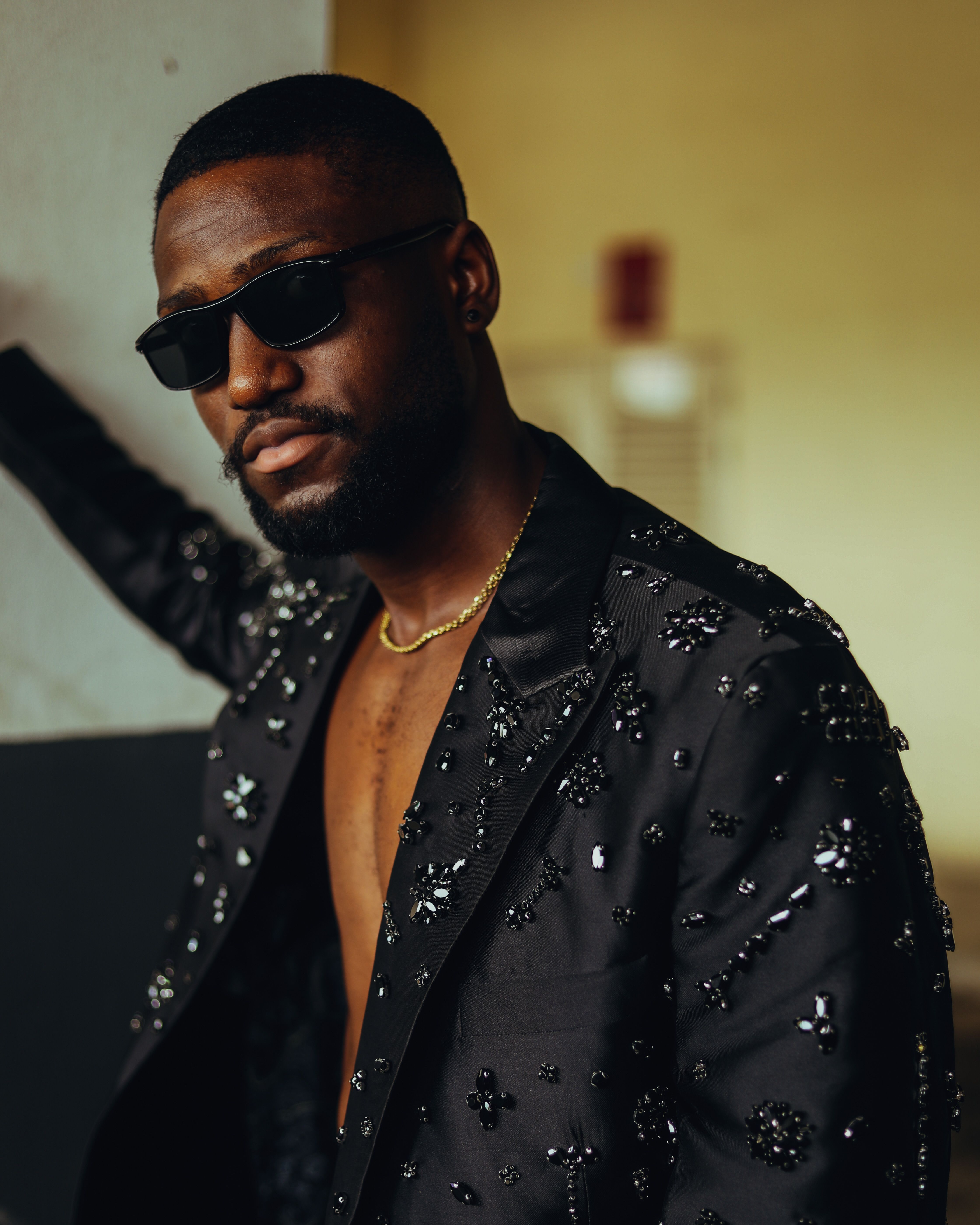 Stylish Man in Embellished Black Suit and Sunglasses · Free Stock Photo