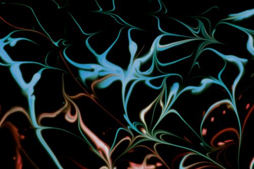 Free Colorful abstract fluid art with swirling blue and red patterns on a black background. Stock Photo