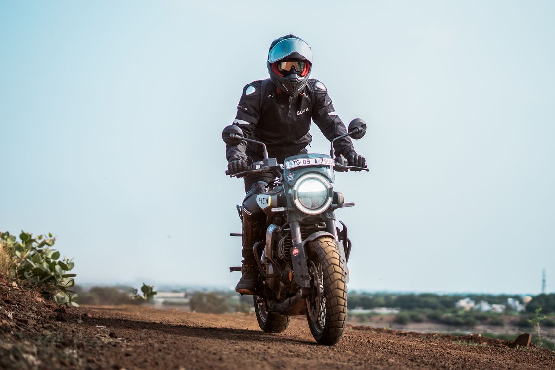Adventure Motorcycle Ride on Dusty Trail · Free Stock Photo
