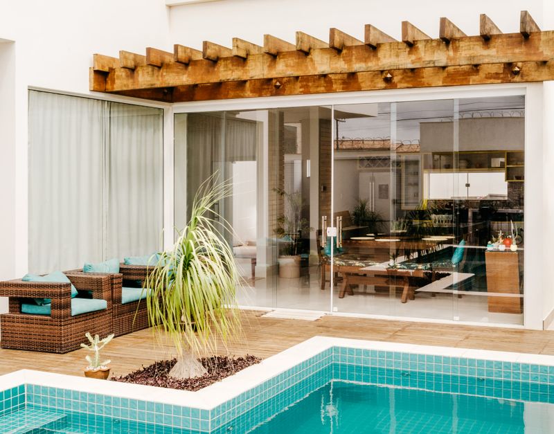 Stylish outdoor patio with pool and modern architecture