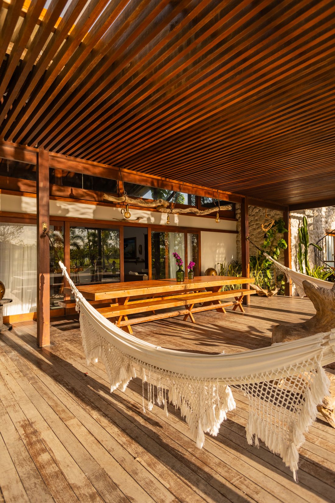 Warm wooden deck and patio with seating.