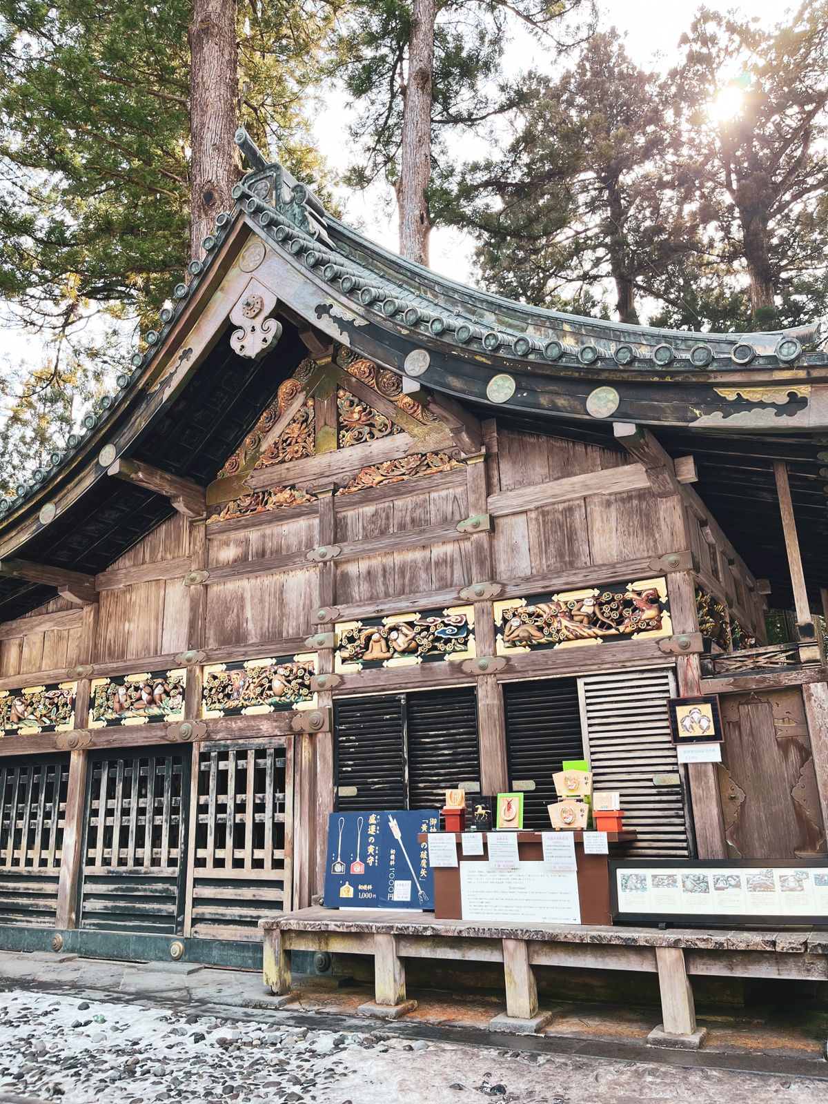 Traditional Japanese wooden temple in a tranquil forest setting, similar to Ise Jingu