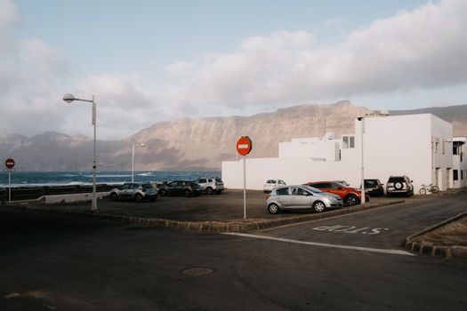 Coastal Parking Lot with Mountain View in Lanzarote
