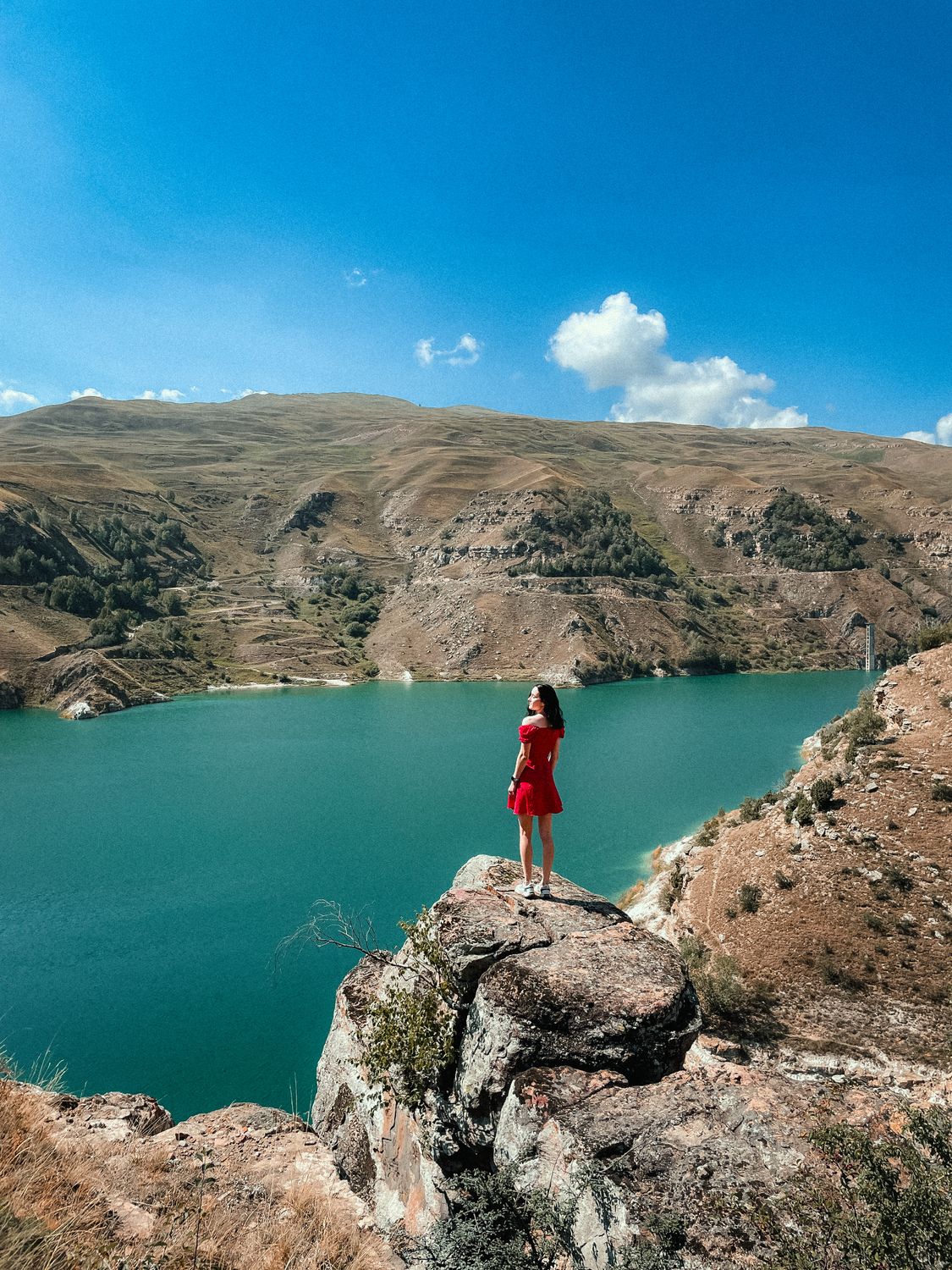 Womanly View Woman in Red Dress Overlooking Scenic Lake and Hills · Free Stock Photo