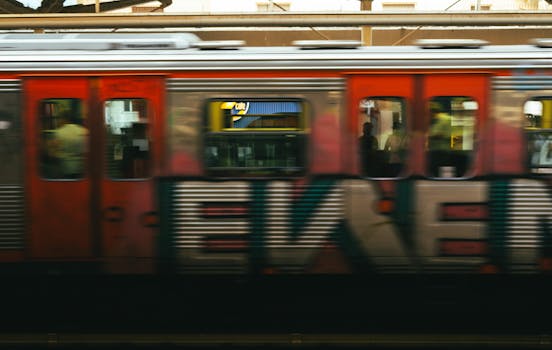 Blurred motion of urban train passing through a station in Athens, Greece.