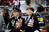 Shallow Focus Photo of Two Persons Wearing Military Uniform