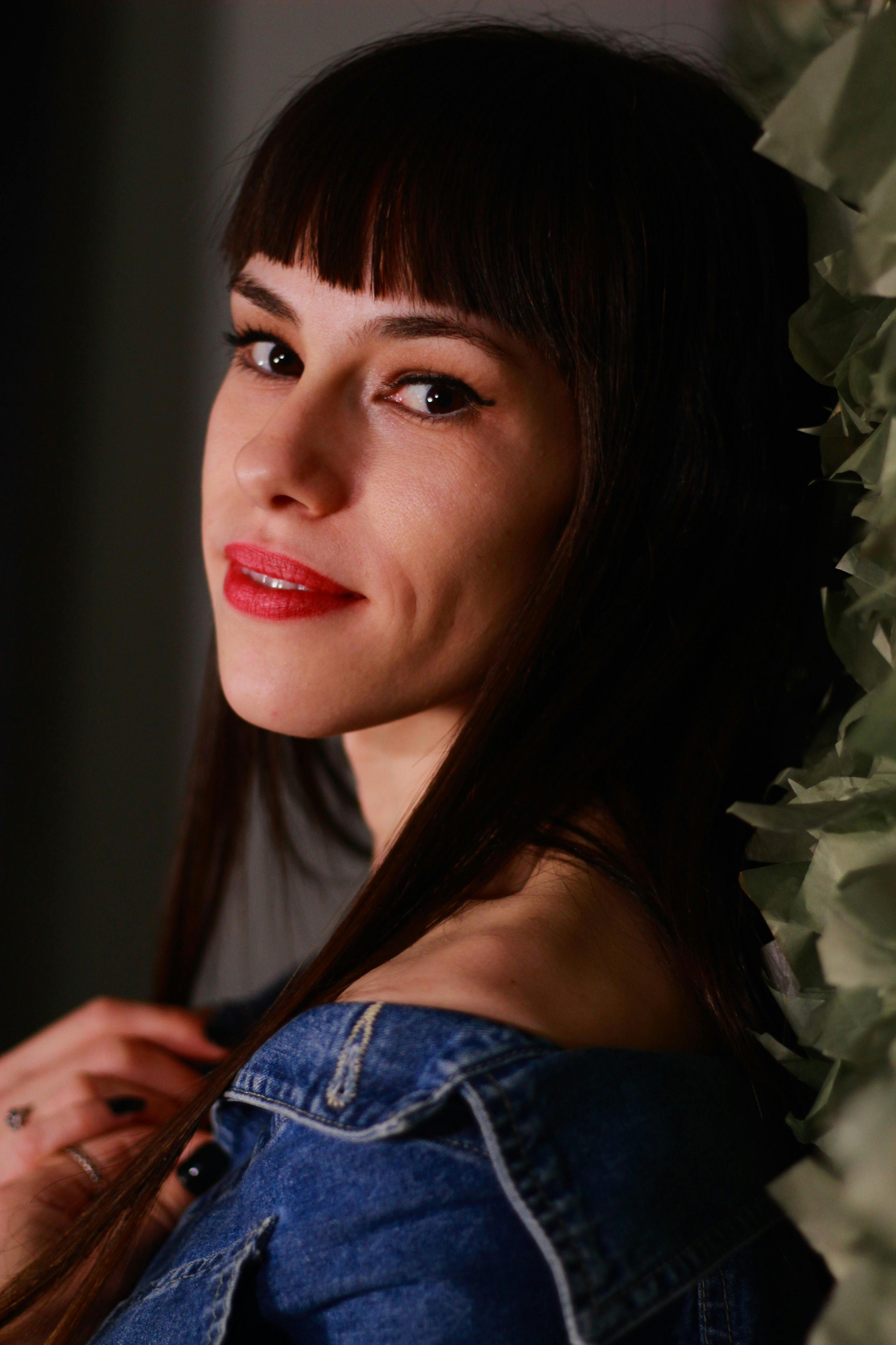 Woman Leaning Beside Wall \u00b7 Free Stock Photo