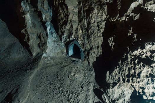 Explore a hidden cave entrance located in the rocky terrain of New Athos.